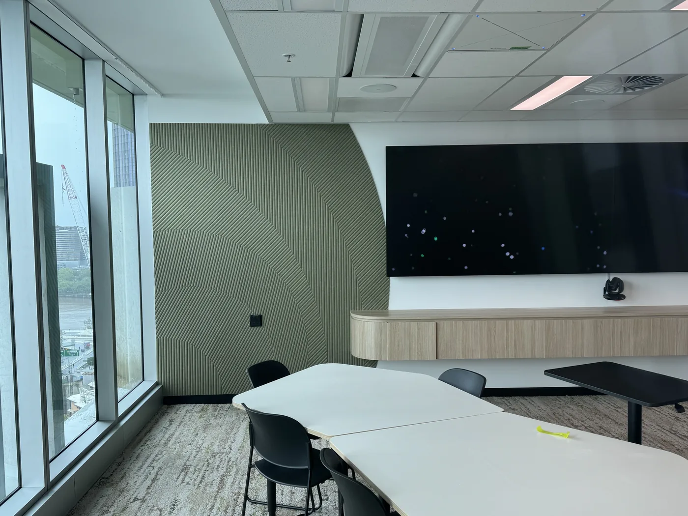 Olive acoustic wall panel — specify systems and finishes