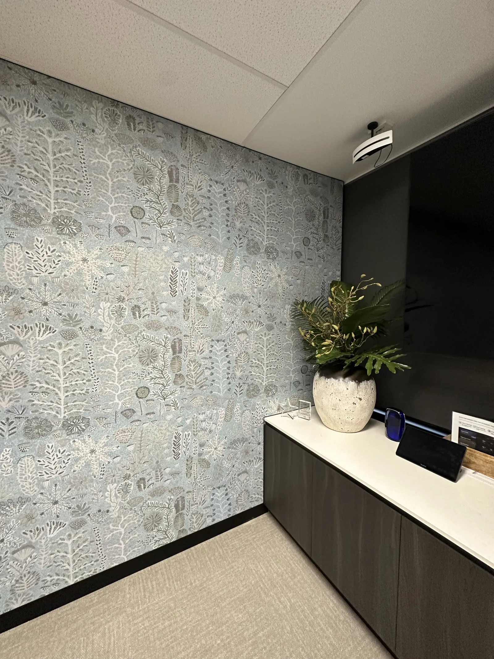 Willie Weston panels meeting the dark AV wall and joinery — Edward Street