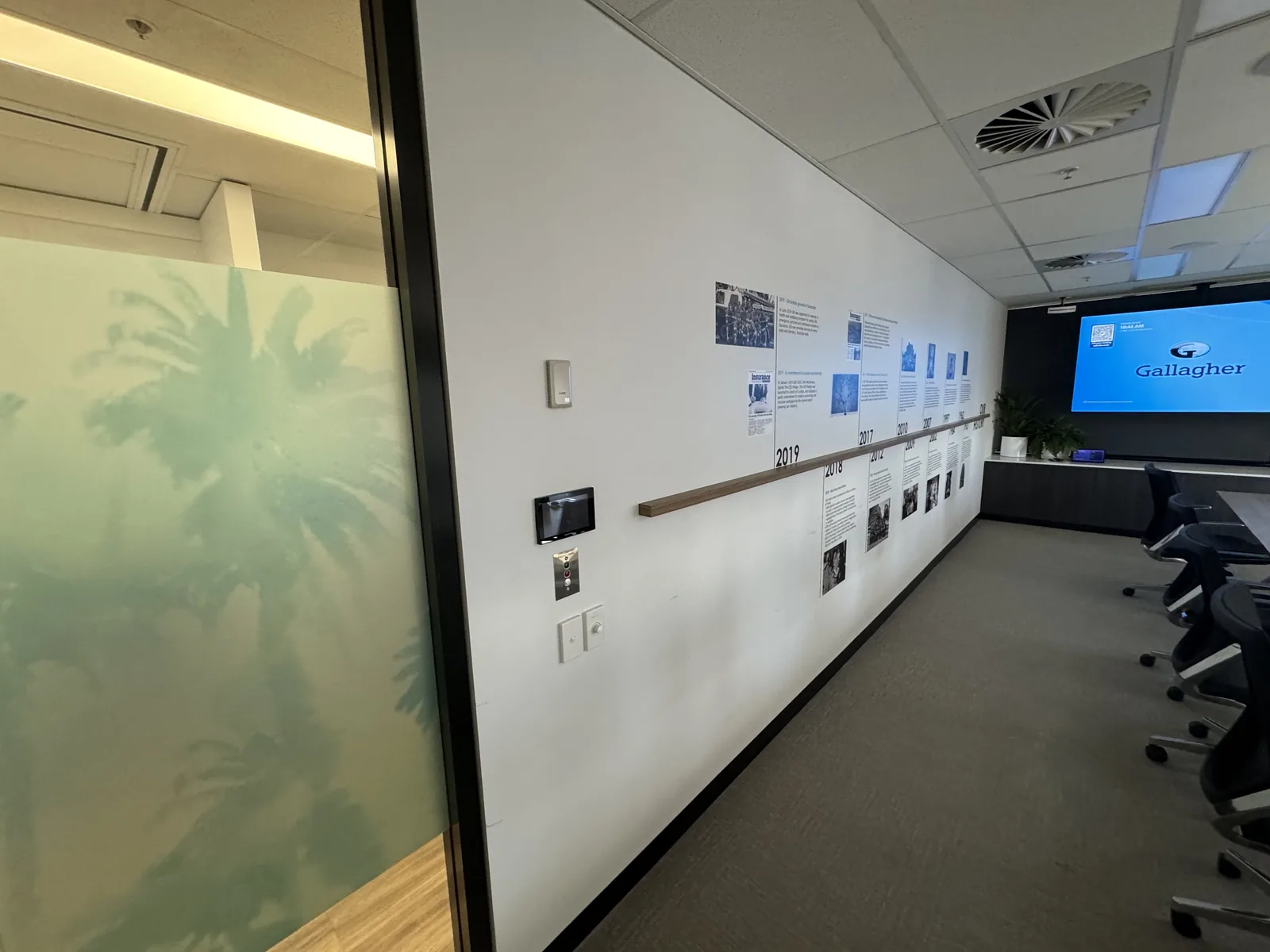 Boardroom wall before acoustic panels — timber belt prior to install, Edward Street